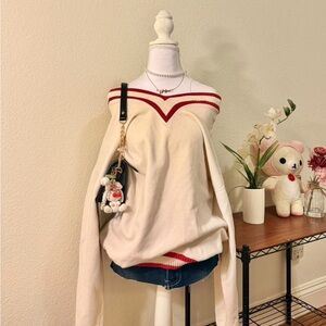 Elegant Off-the-Shoulder Cream and Red Sweater